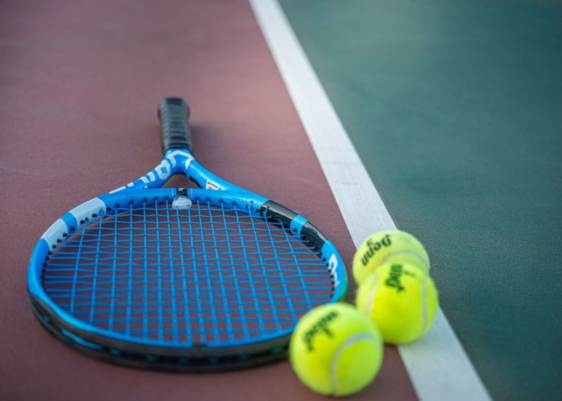 Sports Equipment - yellow and blue tennis racket