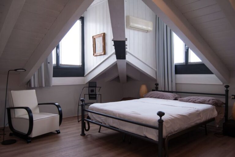 How to Design an Attic Bedroom for Guests?