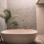 Bathroom Ventilation - white ceramic bathtub
