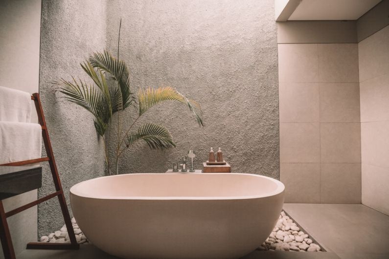 Bathroom Ventilation - white ceramic bathtub