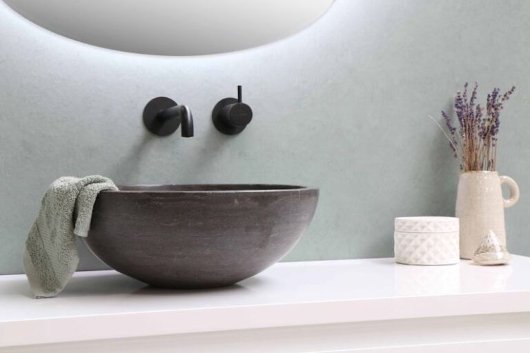 Bathroom - white ceramic bowl on white wooden table