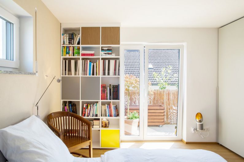 Children's Room - white wooden shelf with books