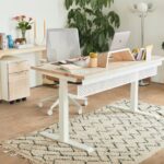 Home Office Desk - a white desk with a laptop on top of it